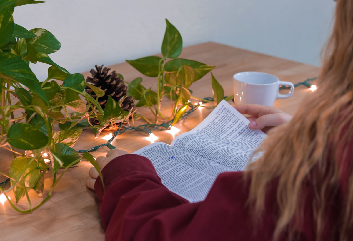 woman holding book